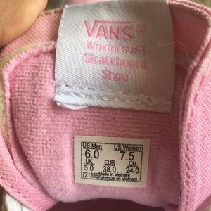 Baby pink high top old Skool Vans off the wall